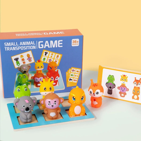 Small animal transposition game with toy figures and packaging on a light background