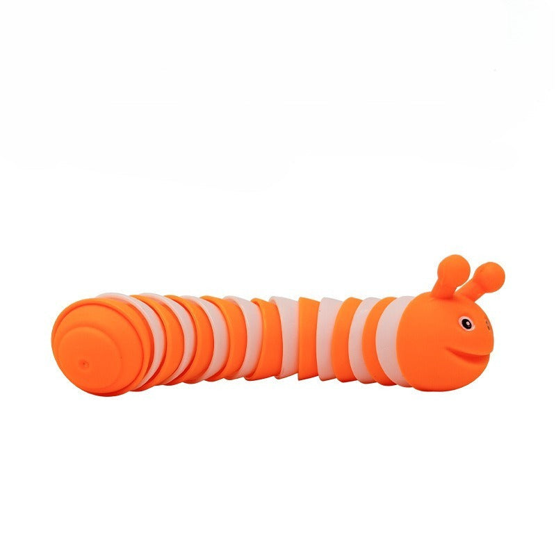 Orange and white toy caterpillar on a white background