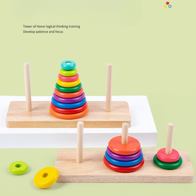 Colorful Tower of Hanoi educational toy on a light green background