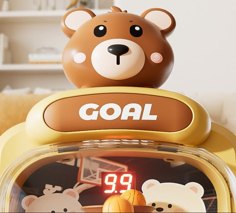 Children's toy with a bear design and 'GOAL' text on a basketball-themed background