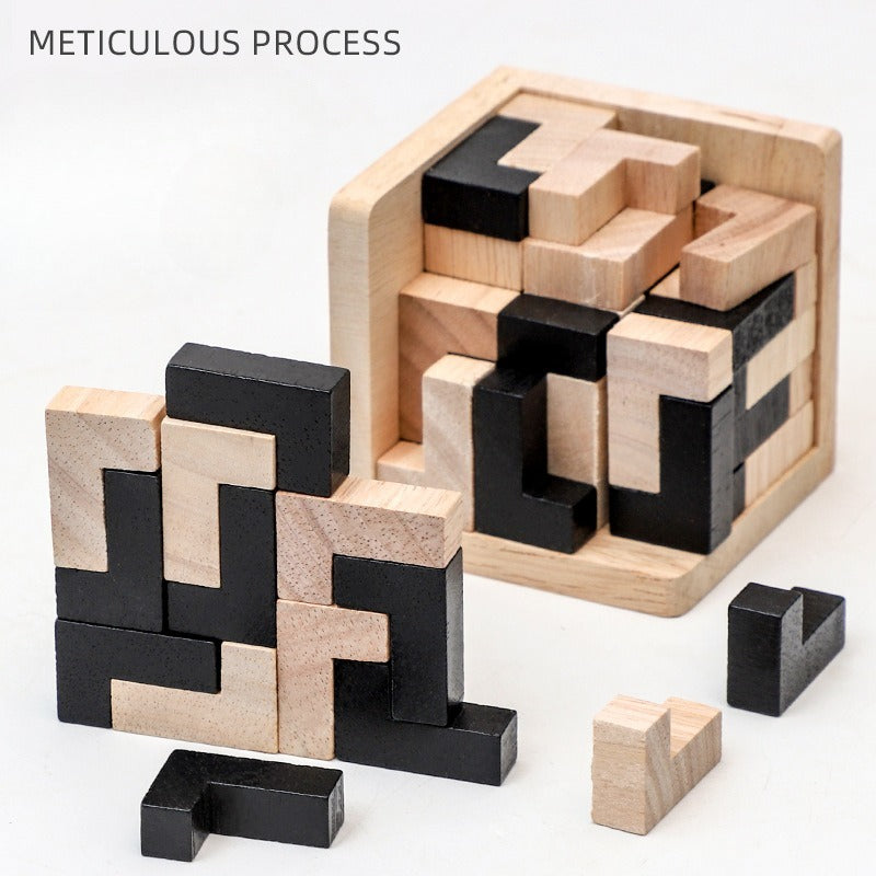 Wooden puzzle with black and beige pieces on a white background