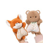 Plush fox and bear hand puppets on a white background