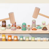 Children's toy set with a xylophone and figurines on a light background